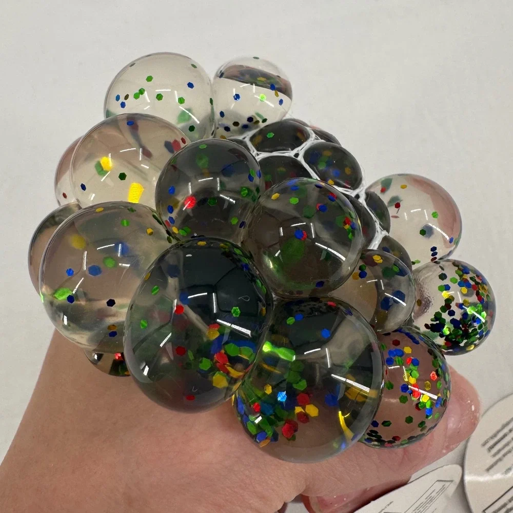 (2) Mesh Squeezeballs Fidget Set Stress Relief Sensory Toys Squish Glitter Stars